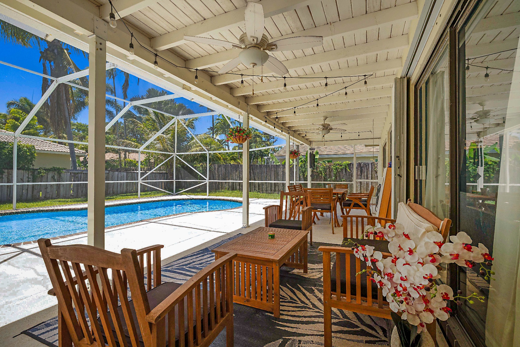Covered patio overlooking the pool